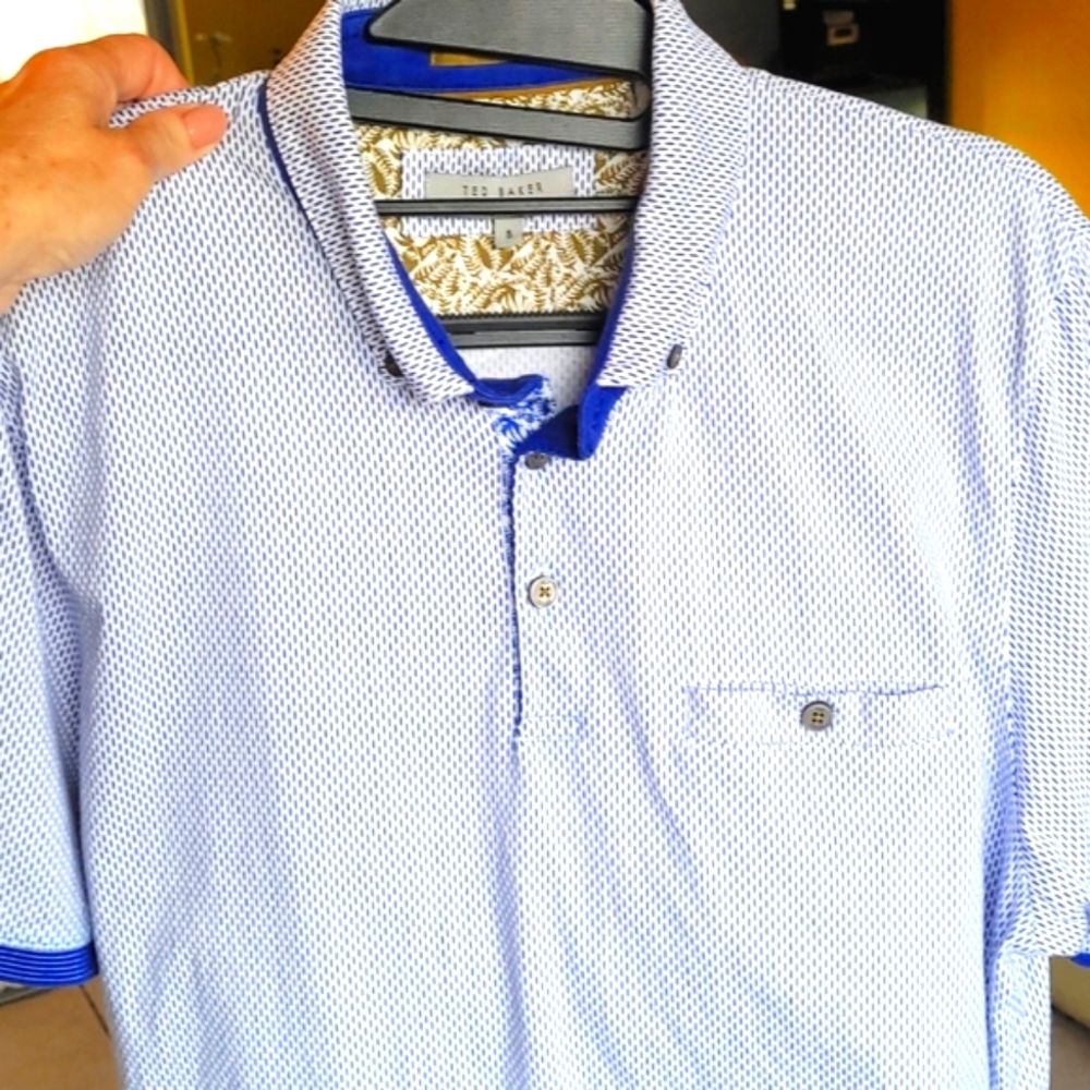 Ted Baker:  Slim fit light blue & white polo.  Golf ⛳️ or everything else.